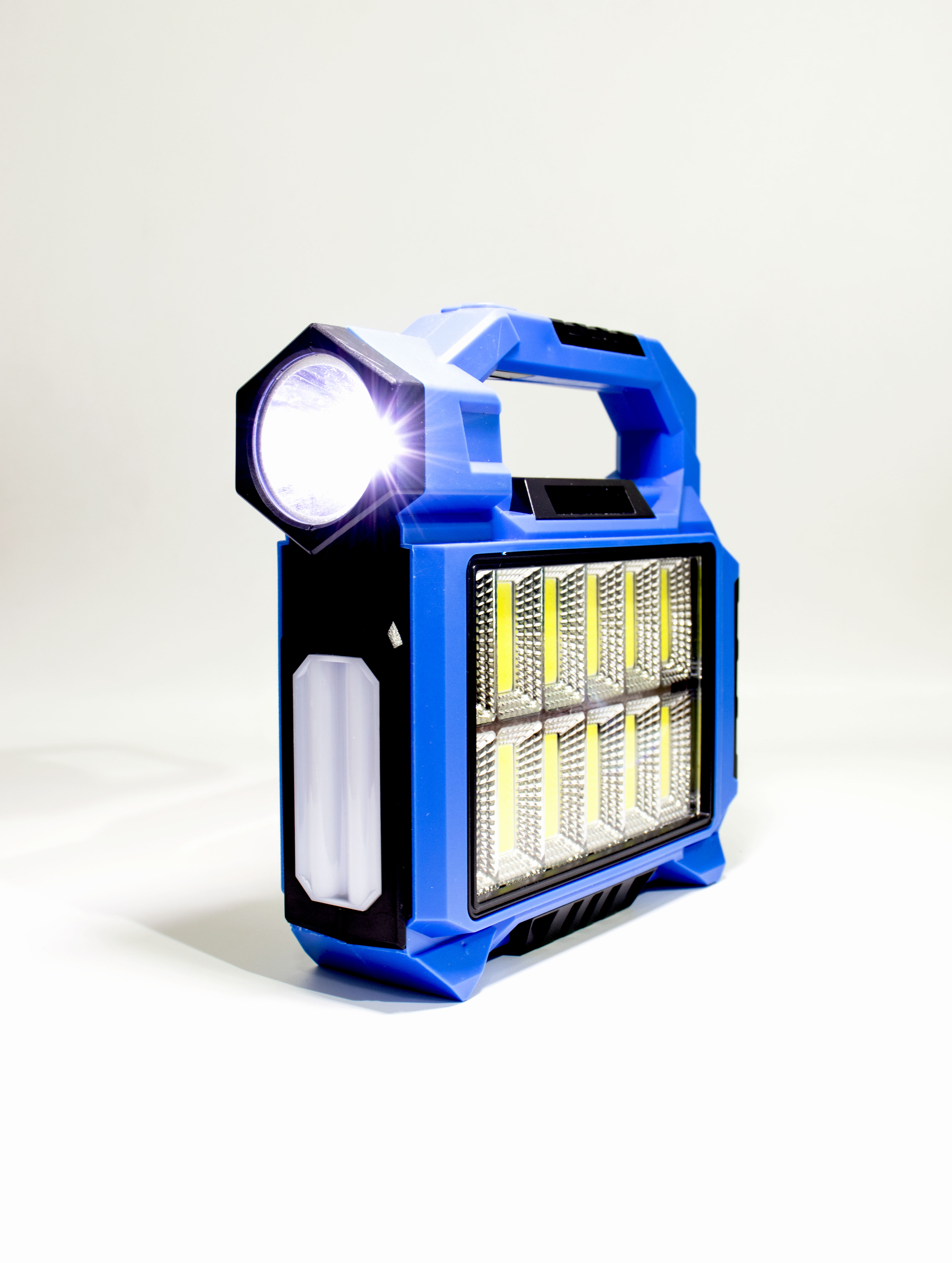 Linterna LED Recargable Multifuncional con Foco, Luz Lateral COB y Panel Solar - Azul Brillante para Camping y Emergencias